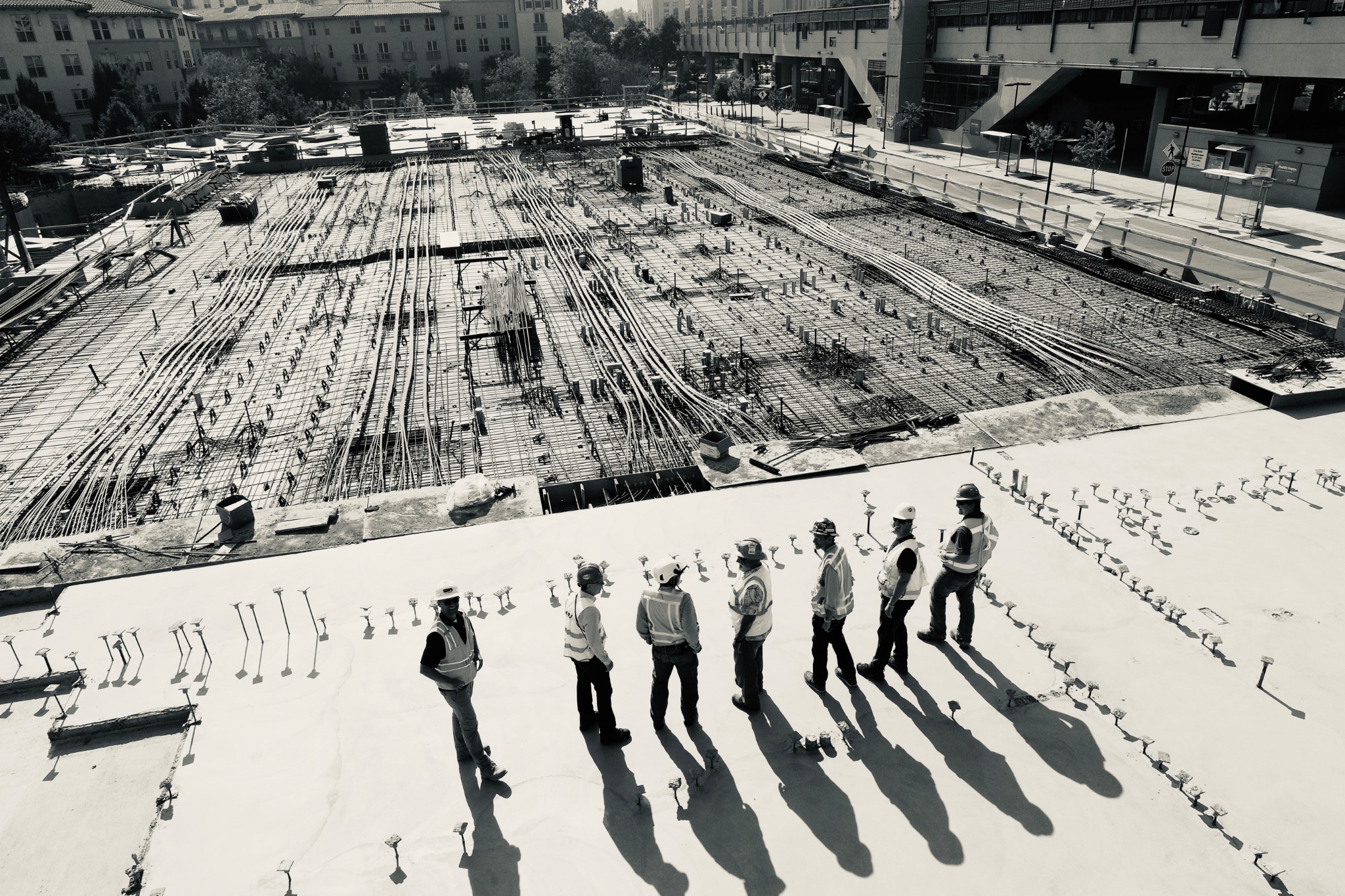 Construction team overlooking a major urban development site